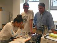 Whitebean '08, Considine '08 and Professor Lehman in the lab.