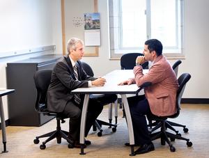 Assemblyman Anthony Brindisi, left, meets with Assistant Professor of Psychology Jose Causadias.