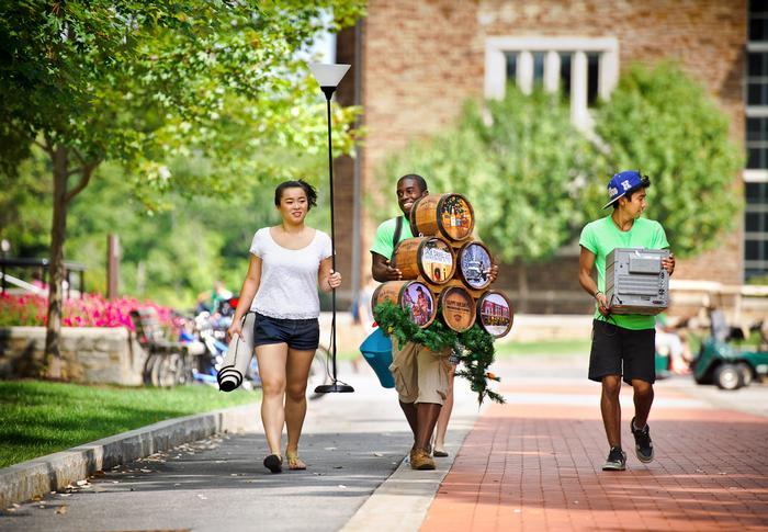 Hannah Tessler '14, Torian Pope '14 and Jaime Leiva '14 haul away their catch of the day during annual Cram & Scram. PHOTO: BY NANCY FORD