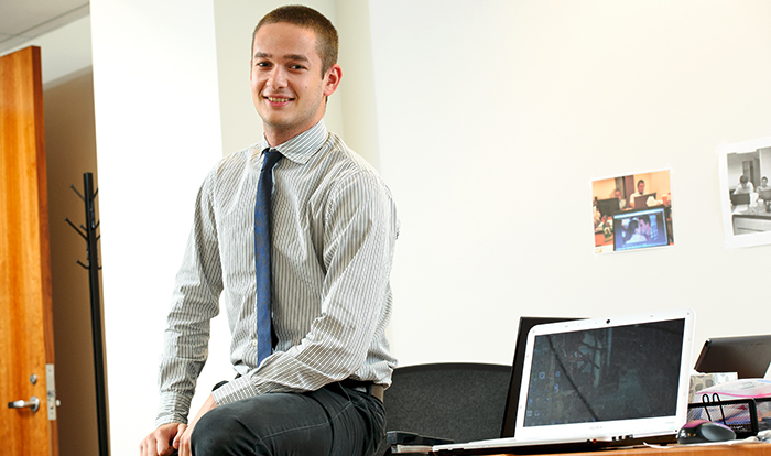 Dima Kaigadorov '16 in the office at his internship at IOS partners. PHOTO: NANCY L. FORD