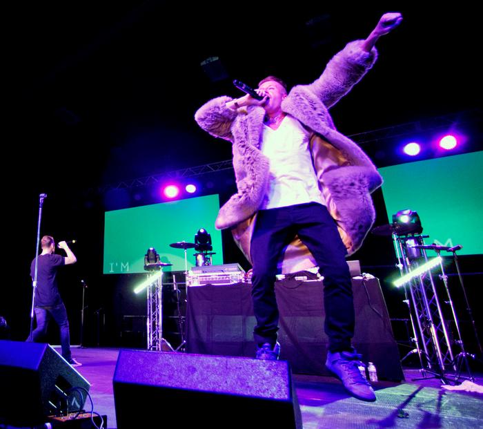Macklemore borrowed a student's fur coat before performing<em>Thrift Shop</em>. PHOTO: BY MEGAN HAMAN
