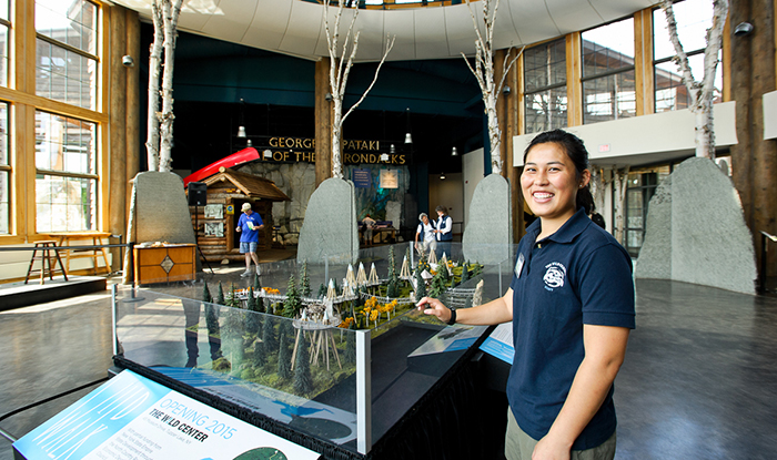 Zoe Tessler '16 poses in the great room of The Wild Center in Tupper Lake, NY. PHOTO: NANCY L. FORD